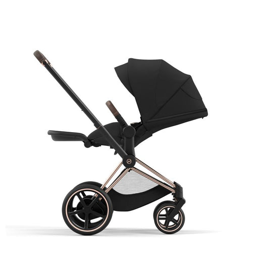 Black stroller with rose gold accents on a white background